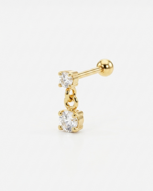 Gold opal piercing