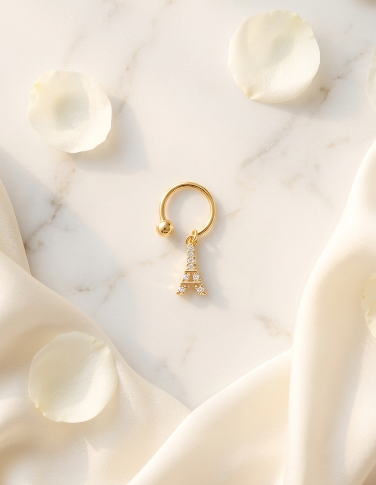 Eiffel charm piercing