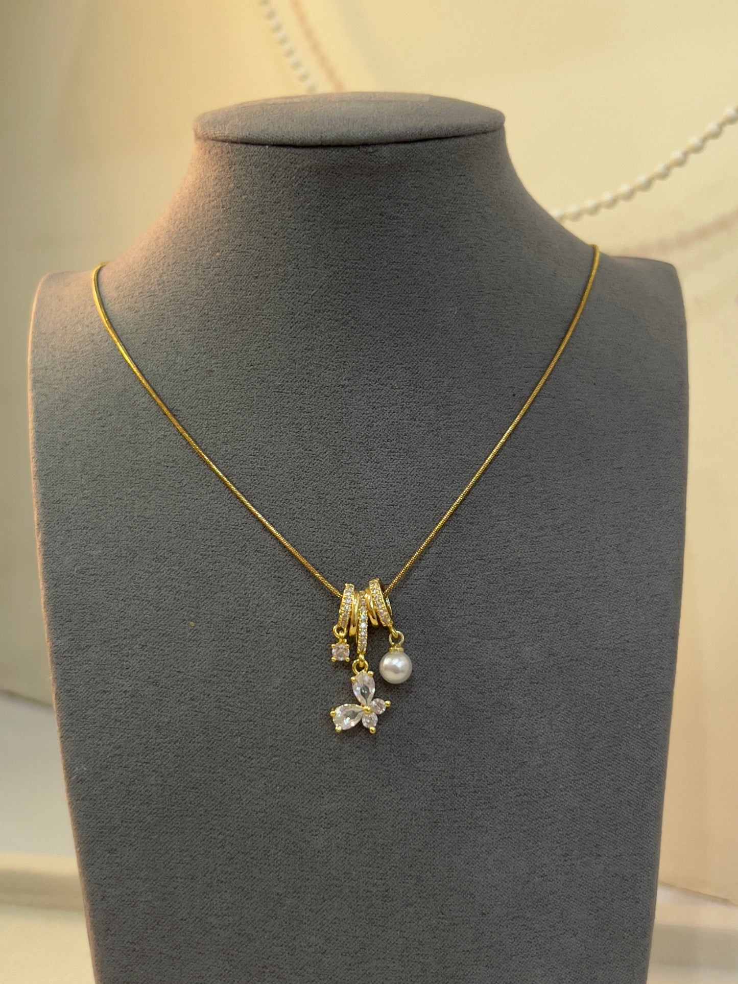 Pearl charm necklace